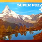 FX SCHMID	98404 Grindjisee Schweiz (Super Puzzle)	1500		Bestand Nr. 025